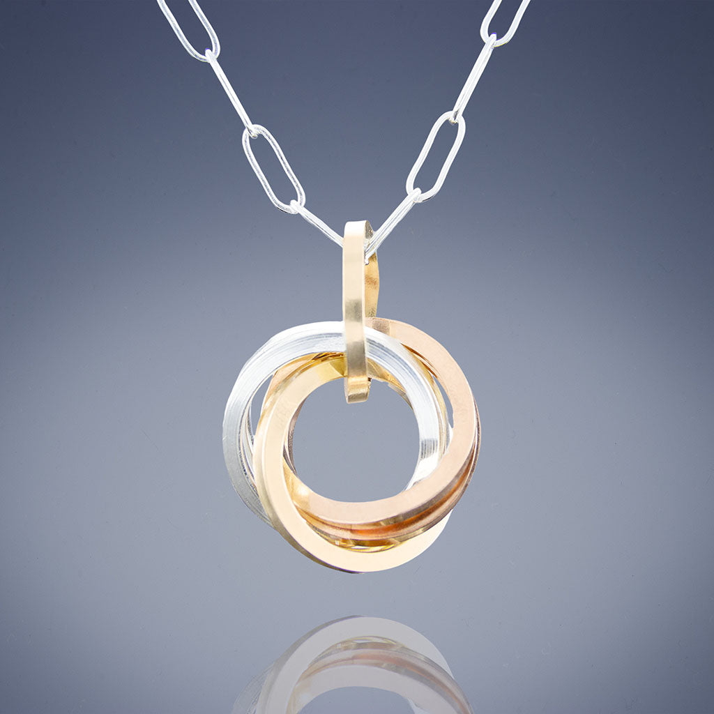 Tri Color Love Knot Pendant Necklace in Silver, Yellow and Rose