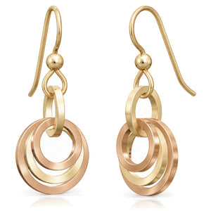Concentric circle dangle earrings in 14K yellow and rose gold fill on french hook ear wires